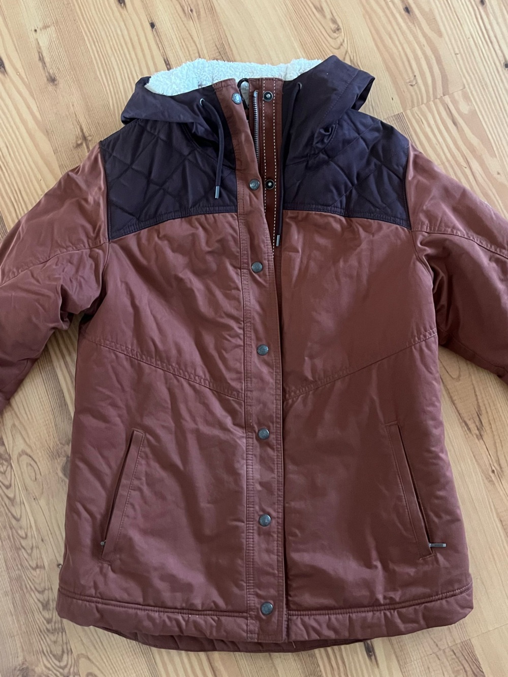 Kuhl Cold Weather Quilted and Sherpa Lined Hooded Jacket in Brown